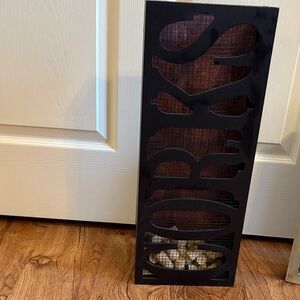 Black Wall Decor with Cutout Design